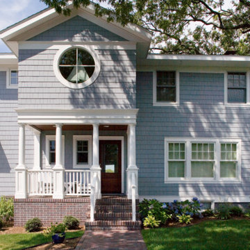 Beautiful Traditional Blue Wooden Siding Suburban Home - White Windows & Frames