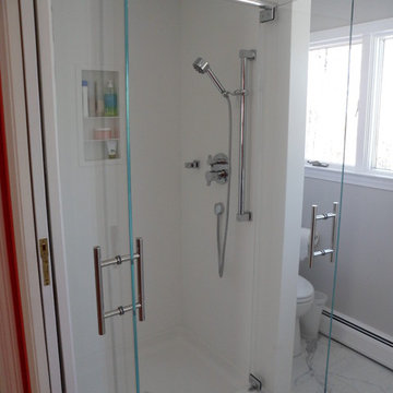 Corian shower walls with glass door