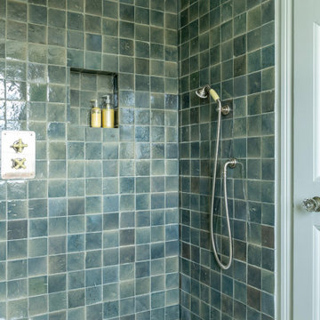 Ensuite bathroom with panelled walls and zellige tiles