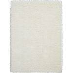 Nourison - Nourison Luxe Shag 9' x 12' Ivory Shag Indoor Area Rug - This exceptionally plush 2-inch-deep flokati rug from the Nourison Luxe Shag Collection has the look and feel of luxuriously soft sheepskin, and makes a perfect addition to any casual room setting. Luxurious texture and soft ivory color for a warm, soothing accent.