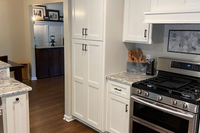 Example of a transitional kitchen design in Omaha
