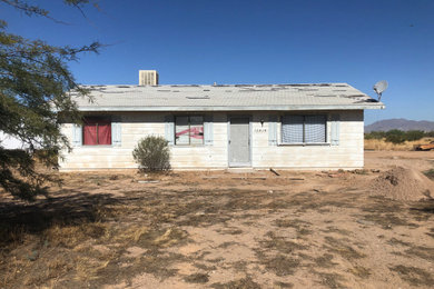 Example of a minimalist exterior home design in Other