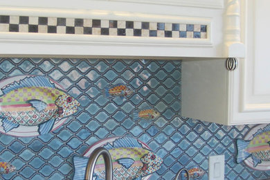 Inspiration for a mid-sized eclectic galley eat-in kitchen remodel in Austin with an island