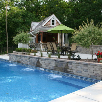 Raised Pool Wall Over Bench with Waterfalls