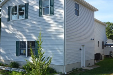 Example of a classic exterior home design in Other