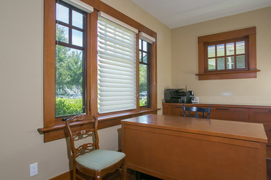 Example of a minimalist home office design in Vancouver