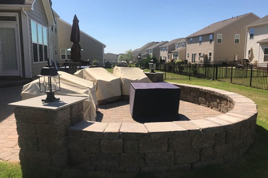 Inspiration for a mid-sized transitional patio remodel in Charlotte