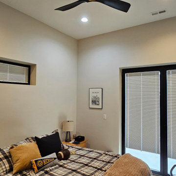 Bedroom w/blackout blinds on European windows