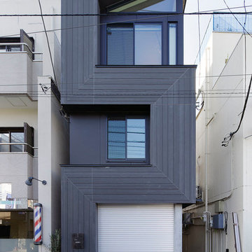 商店街に建つスペインバル+二世帯住宅