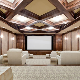 Home theater - large transitional enclosed carpeted home theater idea in Atlanta with beige walls and a projector screen