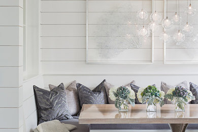 Dining room - contemporary dining room idea in Boston with white walls