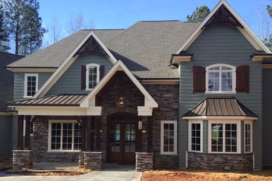 Example of an arts and crafts exterior home design in Charlotte