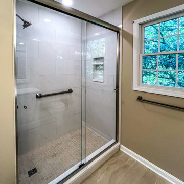 Timeless White Vanity Paired with Luxury Tiled Shower