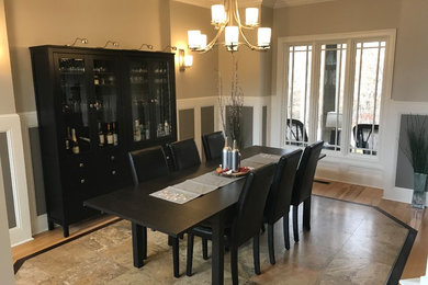 Photo of a contemporary dining room in Atlanta with grey walls.