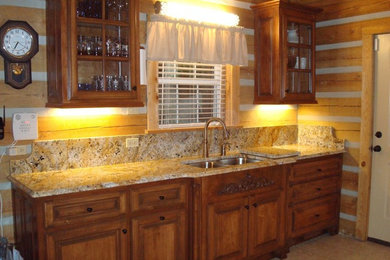 Mid-sized elegant ceramic tile and beige floor kitchen photo in Nashville with raised-panel cabinets, medium tone wood cabinets, granite countertops, multicolored backsplash, stone slab backsplash, white appliances, no island and an undermount sink