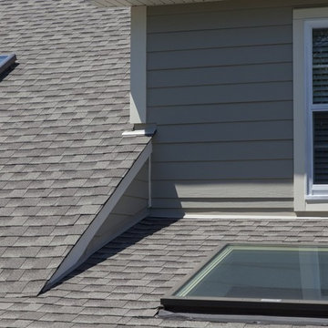 Terrific Taupe! A home with James Hardie Monterey Taupe siding & GAF roof