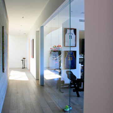 lass-Enclosed Home Gym with Light-Filled Hallway Connection