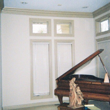 Room make over BEFORE a small nook / piano room , now a home office.