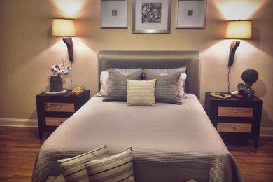 Bedroom - mid-sized transitional master light wood floor bedroom idea in Charlotte with beige walls and no fireplace