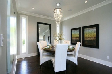 Elegant dining room photo in Vancouver