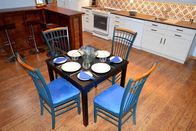Dining area with Ikea table and consignment chairs