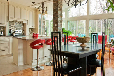 Example of a large classic light wood floor sunroom design in New York with a standard ceiling