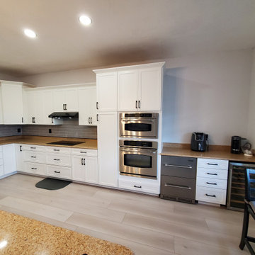 Transitional Kitchen Remodel Done in Satin White Shaker Door