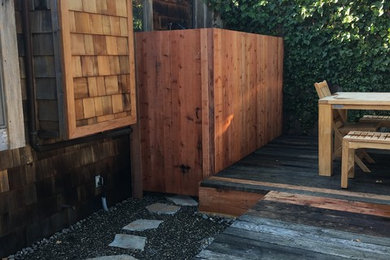 Mid-sized beach style backyard outdoor patio shower photo in Other