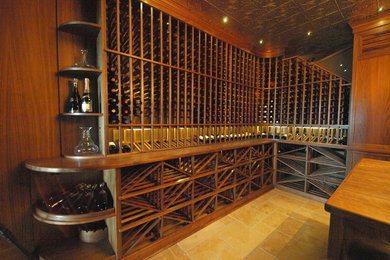 Inspiration for a mid-sized timeless wine cellar remodel in Calgary