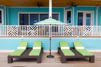 Beach style home design photo in Other