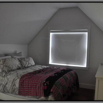 Room-darkening roller shade for bedroom.