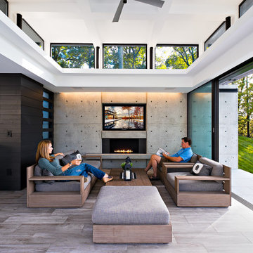 Waterfront Stone Modern Home and Pool House