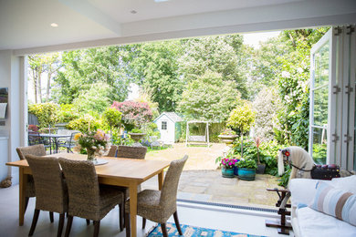 Design ideas for a medium sized classic kitchen/dining room in London with white walls.