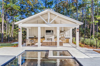 Example of a country patio design in Other