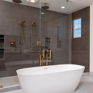 Elegant master bathroom with large format tile