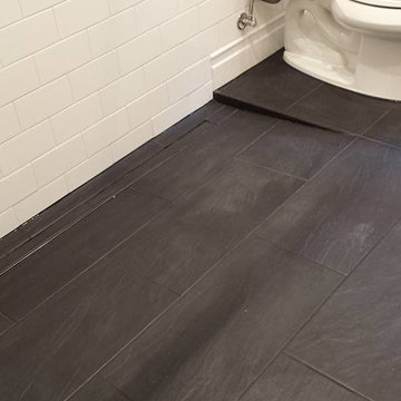 Takoma DC traditional back and white bathroom with penny tile
