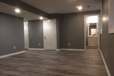 Arts and crafts basement photo in Other