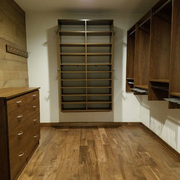 Custom Rustic Walk-in Closet by Closets For Life