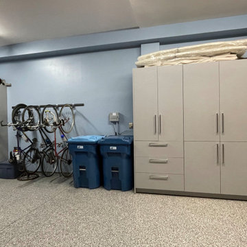 Zones for bikes and trash cans plus storage behind closed doors.