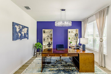 Example of a transitional home office design in Dallas