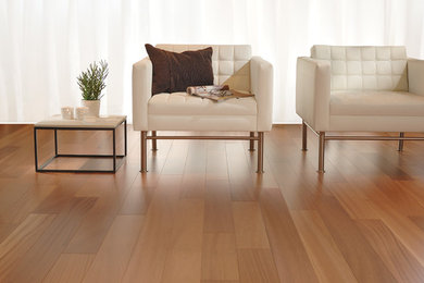 Mid-sized trendy formal and open concept medium tone wood floor and beige floor living room photo in Detroit with white walls, no fireplace and no tv
