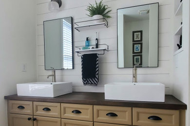 Inspiration for a farmhouse bathroom remodel in Charlotte