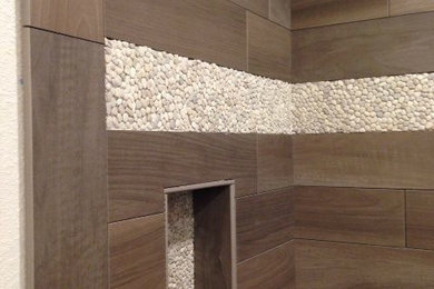 Porcelain wood planks with pebble accent