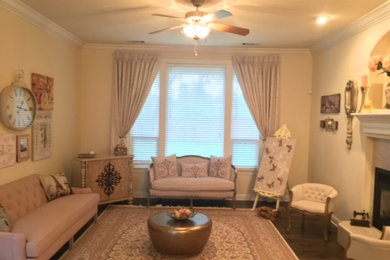 Inspiration for a mid-sized timeless formal and enclosed dark wood floor and brown floor living room remodel in Other with beige walls, a standard fireplace, no tv and a stone fireplace