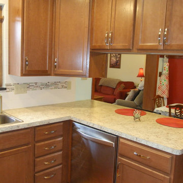 Kitchen Reconfigured to Brightens and Expand Storage