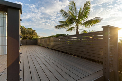 Imagen de terraza planta baja minimalista en patio trasero