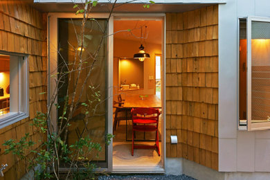東京23区にあるお手頃価格の小さな北欧スタイルのおしゃれな中庭のテラス (コンクリート板舗装	、日よけなし) の写真