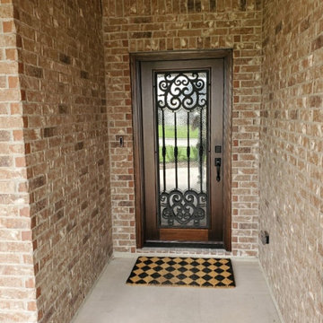 Wood Doors with Wrought Iron