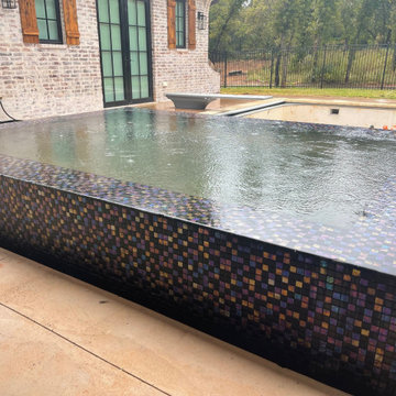Polymer vinyl liner pool w/concrete spillover spa & automatic pool cover