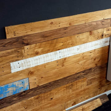 Reclaimed Colourful Pallets and Floorboards Wall